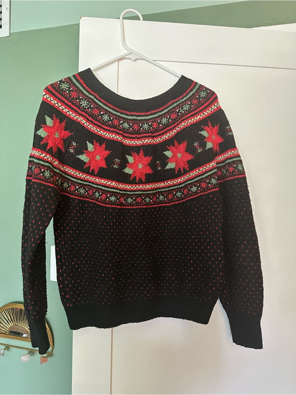 Black Holiday Sweater with Poinsettia Motif